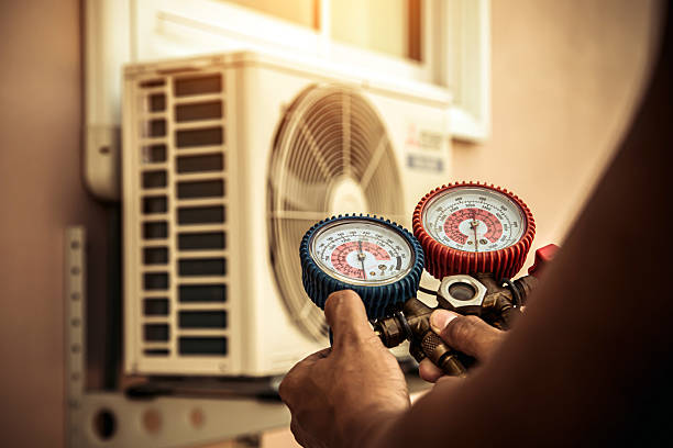 Professional Hvac technician working in Abita Springs, LA